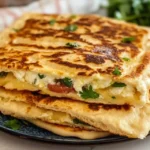 Crispy golden cottage cheese flatbread cooked to perfection on a skillet – no more sogginess, just light and delicious results.