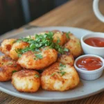 Golden and crispy hash browns frying in a non-stick skillet.