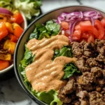 Grilled burger patty, showcasing the healthiest way to prepare a burger.